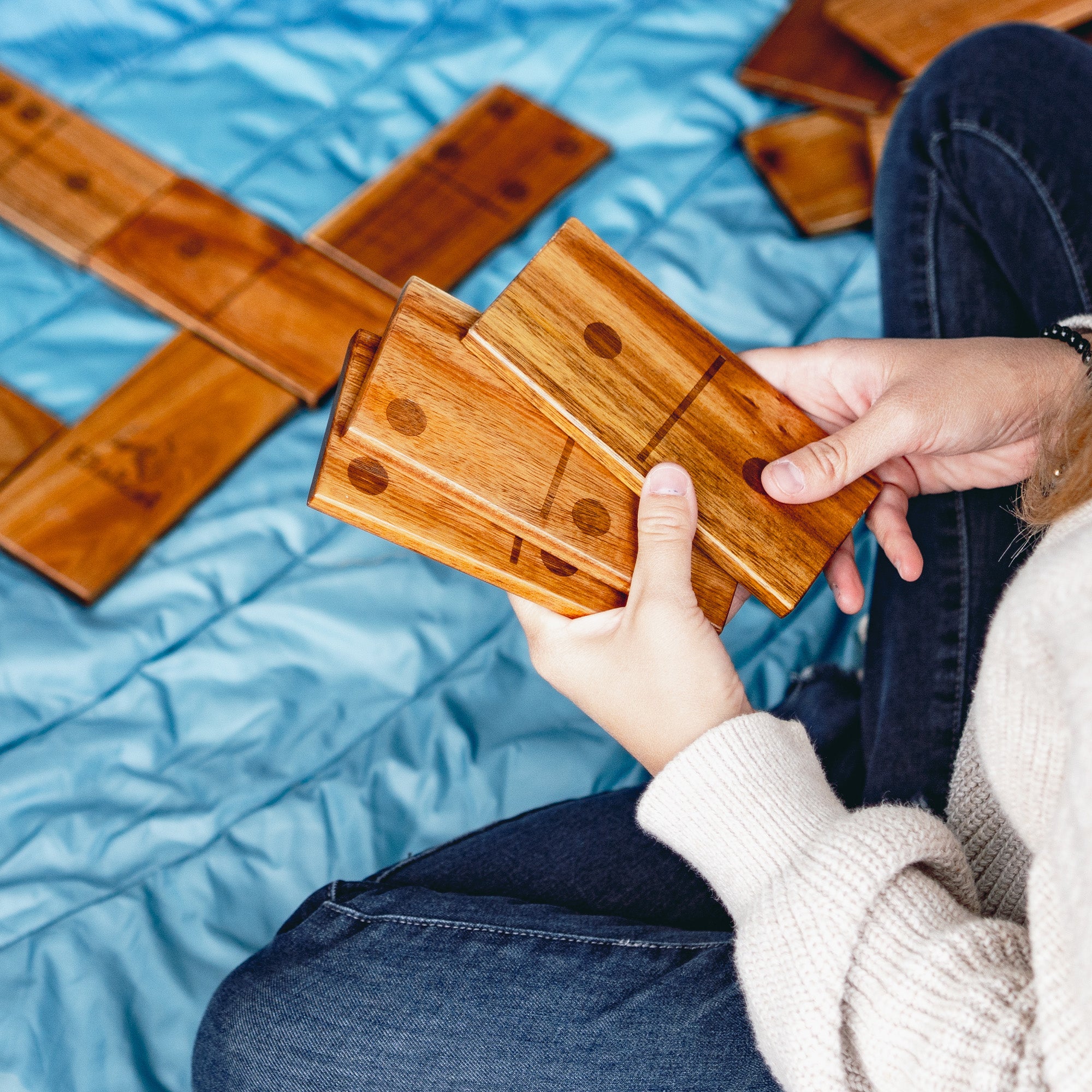 Person Holding Elakai Giant Dominoes